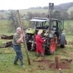 Rodney and Peter MacBean, the landowners, drilling holes for fence posts